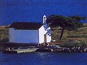 Island with a small curch across Pakostane